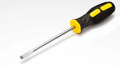 Flat-head screwdriver with a yellow and black handle on a white background.